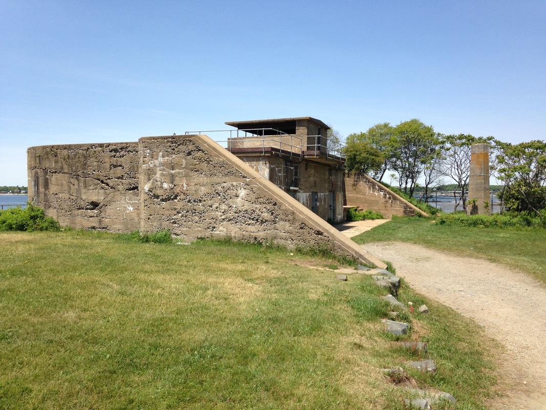 Side view of bunker with pillar behind it